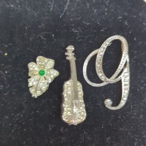 collection of vintage-style rhinestone brooches
